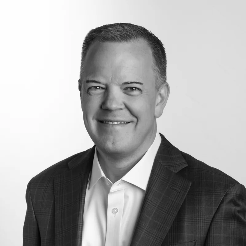 Black-and-white headshot of Aaron Klein.